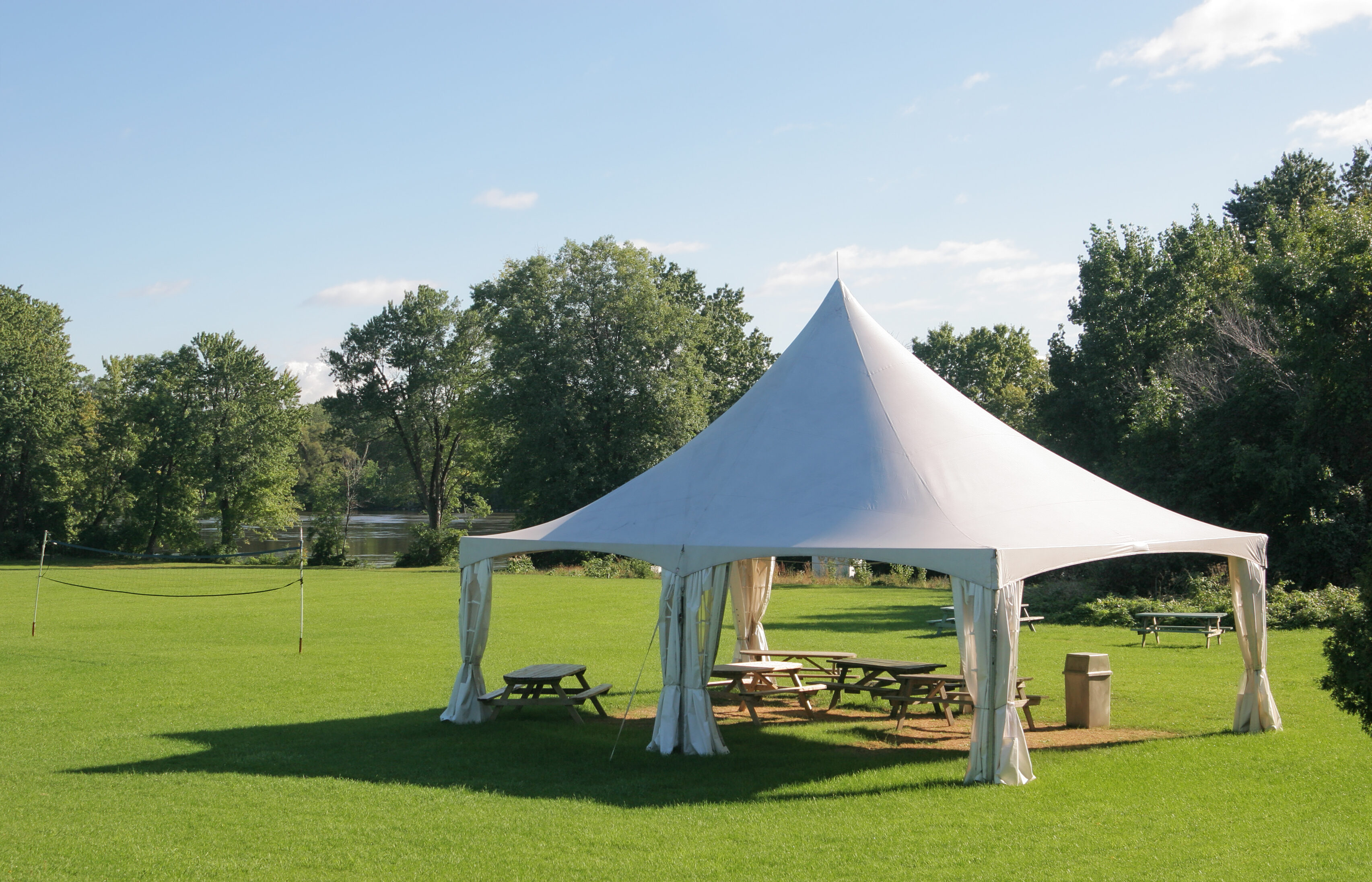 Small Marquee Tent with picnic tables in a park